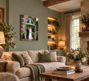 Acrylic wall print of a bride and groom in a stone doorway, hanging in a cosy living room