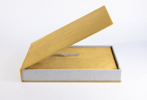 Dijon Yellow velvet wedding album inside its matching velvet album box with the lid open