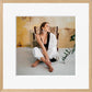 Square framed photo print in a natural oak frame with a white mount