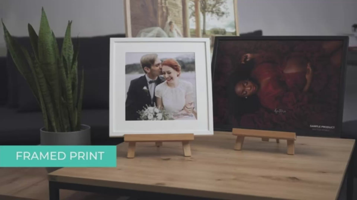 Load video: Framed prints in black, white and oak frames, shown with and without a white mount, ready to hang