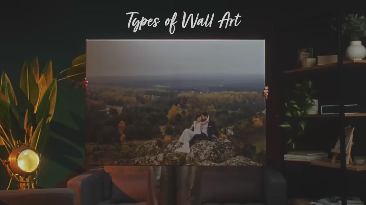 Load video: Wall art prints compared: woman holding a canvas print, framed print and acrylic wall print of a wedding photo to show sizes from 60x40cm to 100x70cm