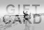 WeddingAlbums.ie gift card featuring a black and white photo of a bride and groom in a snowy landscape